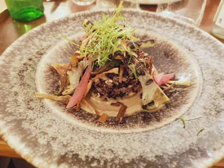 Black rice and artichoke dish at La Belle Verte in Toulouse